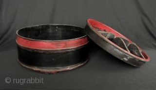 Khmer Betel Box:  
Nice old red and black lacquered Cambodian Siri (betel) box container. This has the original small feet on the bottom, very difficult to find these days. There is  ...