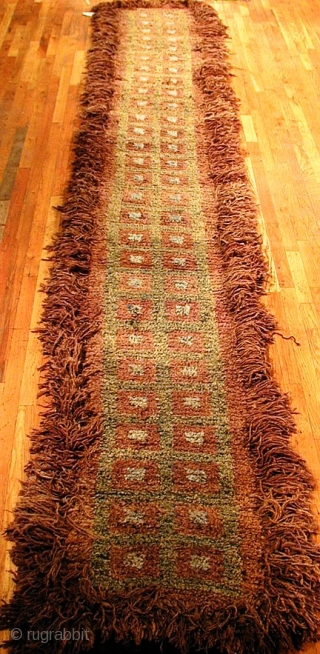 Type: TIBETAN seating rug
Origin: TIBET 
Circa: 1880 
Size/Feet & Inches: 2'7'' x 14'7'' 
Size/Meters: 0.78 x 4.44 
               