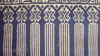 Cross Stitch Silk Embroidery on indigo hand span cotton, on an ivory hemp.   1.27 x 0.58 M.    Zhuang, China.   Late 19th Century.


    