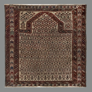 Unusual and rare Yomut Turkmen prayer rug. Circum-Caspian zone, most probably Ogurjali work (traditional for the tribe irregularities, colouring, set of borders, etc.), although with definite traces of 'foreign intrusions' for the  ...