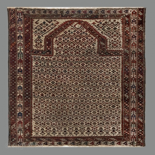 Unusual and rare Yomut Turkmen prayer rug. Circum-Caspian zone, most probably Ogurjali work (traditional for the tribe irregularities, colouring, set of borders, etc.), although with definite traces of 'foreign intrusions' for the  ...