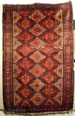 Baluch with traces of the original brocaded kilim ends; wool is soft lustrous and very silky. The ground aubergine-brown is corroded giving to the pattern a nice relief effect.Late 19th or early  ...