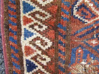 Worn and torn, but cheap old Baluch bagface with interesting animals woven on the kilim ends.
19th c, 79x115 cm.              