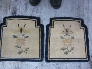 Two shaped Peking Chinese mats circa 1920's,each measuring 1.5 x 1.5.Charming mats with lush,unworn piles,with indented top corners.The creamy beige fields of each has a butterfly and paeony spray on an otherwise  ...