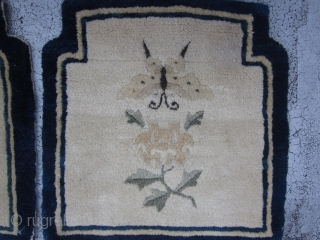 Two shaped Peking Chinese mats circa 1920's,each measuring 1.5 x 1.5.Charming mats with lush,unworn piles,with indented top corners.The creamy beige fields of each has a butterfly and paeony spray on an otherwise  ...