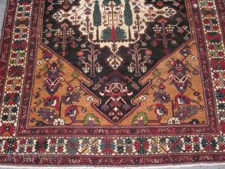Antique Bakhtiari rug,Chahar Mahal district,West Central Persia circa 1920's,measuring 6.7 x 5.2.This is a village piece made on cotton foundation with single weft technique.The rug has a midnight blue / black hexagonal  ...