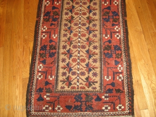 Antique Baluchi Rug circa 1900 , 5.4 x 2.7
The natural camel hair field displays a striped tree of life with fan shaped leaves on bent branches.The foundation is all wool with a  ...