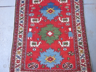 Perpedil Shirvan Rug circa 1920 , 3.1 x 2
 This rare miniature rug exudes cuteness.The two figures holding flowers,the six ivory birds characteristic of larger Perpedil rugs,the alternating light blue and kelly  ...