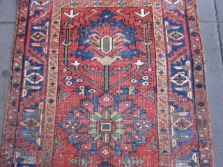 Antique Heriz Small Rug , 4.3 x 2.9 . Early 20th Century
This small rug with all natural dyes displays two giant blue palmettes above and below a central rosette,on a madder red  ...