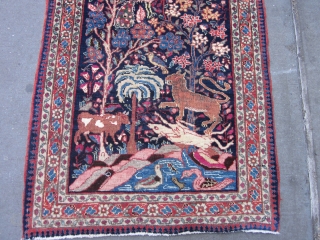 Antique Tabriz Pictorial Mat circa 1920's , 3 x 2.3
A very amusing and informal small rug from Tabriz.The navy field of this "pushti"has a whole jungle packed into a small format.It comes  ...