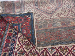 Antique Caucasian Daghestan Prayer Rug , Last Quarter 19th Century 5.10 x 4.3
The ivory ground with a sawtooth lozenge lattice enclosing various colourful flowers in an allover "V' effect is classic Shirvan  ...