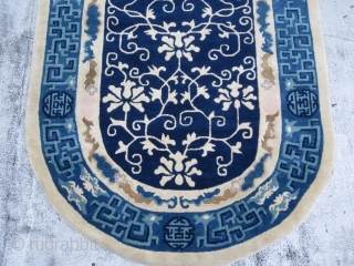 Peking Chinese Oval Rug circa 1920 , 7.9 x 4.1
What a lucky rug ! The shou symbols of the border along with the paired bats are Chinese good luck devices.The fretwork in  ...