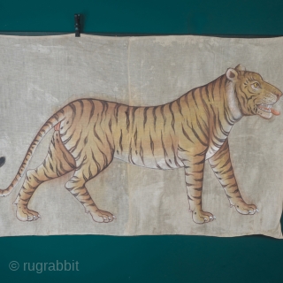 A highly decorative and very rare Indian Tiger painting. Late 19th/ early 20th century. Rajasthan, oil pigments on cloth, later black cloth backing, 105cm x 155cm.



An especially fine example, the drawing is  ...