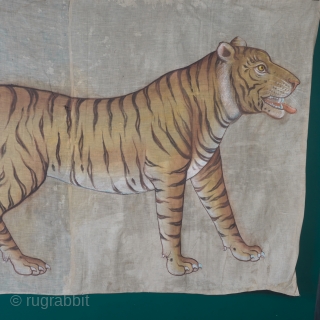 A highly decorative and very rare Indian Tiger painting. Late 19th/ early 20th century. Rajasthan, oil pigments on cloth, later black cloth backing, 105cm x 155cm.



An especially fine example, the drawing is  ...