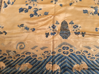 Rare Gold And Blue Chinese Altar Cloth

Blue, cream and gold floss silk embroidery in peking knot and satin stitch on a satin silk gold ground comprising four joined panels. The main field  ...