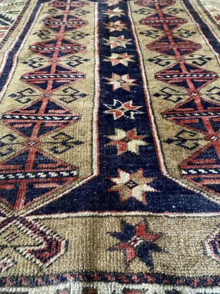 Small Anatolian Kozak rug (thanks John Bakti) with deep natural colors and glossy wool. Three humanoid figures in the border (1 in upper, two in lower). Tribal pattern (similar examples have been  ...