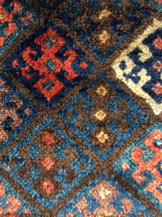 The shiniest wool you've ever seen on a Jaf. There is some goats hair in the ply. Good aubergine, best red and several excellent blues. Unusual Turkoman inspired border. Perhaps from Kelardasht?  ...