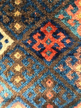 The shiniest wool you've ever seen on a Jaf. There is some goats hair in the ply. Good aubergine, best red and several excellent blues. Unusual Turkoman inspired border. Perhaps from Kelardasht?  ...