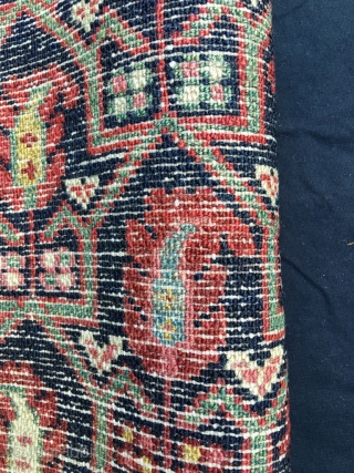 Ancient NW Persian bagface. Wool on homespun cotton. Oblong size and subject (boteh in tulip shaped 'case') would suggest Afshar, as does the cotton foundation, but neither the wool, the colors, the  ...