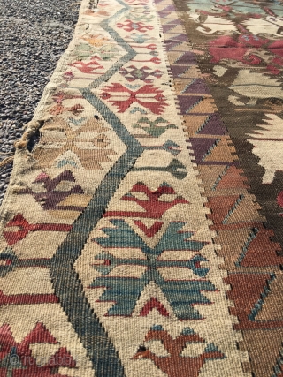 Excellent Anatolian kilim, circa 1800, Double Carnation design, very good border and sides (elibelinde), single wing. In outstanding condition, fine weave, perfect colors, including purple and apricot. Rich details. As found, needs  ...