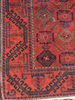19th century Baluch, unusual Mina Khani design, wide ferocious border. Soft wool and good colors. Corrosion of black dye. Size 48.8 x 40.2 (124 x 102 cm).      