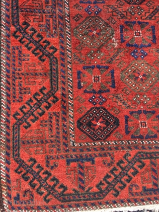 19th century Baluch, unusual Mina Khani design, wide ferocious border. Soft wool and good colors. Corrosion of black dye. Size 48.8 x 40.2 (124 x 102 cm).      