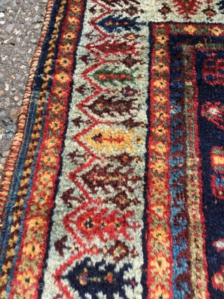 Afshar masnad in classical Kirman pattern with unsurpassed cypres border. Best colors and softest wool. Professionally hand washed. 2nd half 19th century, wool on wool. Original selvedges. Corrosion in the red /  ...