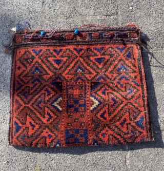 Luri Bakhtiari double khorjin with very unusual reciprocal birds head motif - many of them, also tilted. Glass beads, nice tasche like  back and piled closure tabs. Bridge missing, wonder what  ...