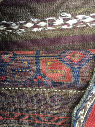 Baluch complete half khorjin. Very good colors, front good condition, some wear upper third, kilim back distressed. Original closure system. Nice filler motifs in the left side. Some fuchsine knots in the  ...