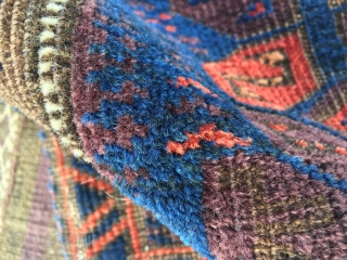 Baluch complete half khorjin. Very good colors, front good condition, some wear upper third, kilim back distressed. Original closure system. Nice filler motifs in the left side. Some fuchsine knots in the  ...