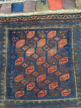 Baluch complete half khorjin. Very good colors, front good condition, some wear upper third, kilim back distressed. Original closure system. Nice filler motifs in the left side. Some fuchsine knots in the  ...