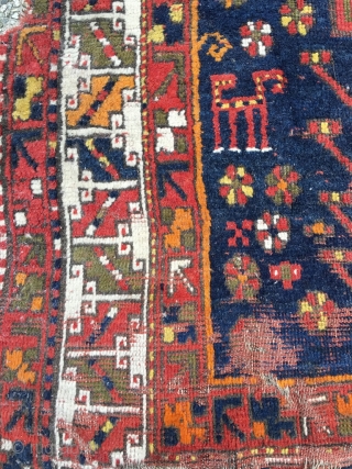 Anatolian fragment with headless human figure and seven camels. 19th century, Konya? Deeply saturated colors, soft wool. Cut but not shut. Bare edges protected by cotton band. Good condition given the age.  ...