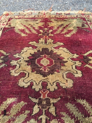 First half 19th century Kirsehir yastik. Oblong orientation of the design, as a cushion front, not a wall hanging. Refined and irregular drawing, still reminiscent of the great Ushak era, before standardization  ...