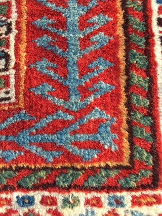 Tribal Qashqai kelleh from around 1900. Excellent condition, full pile, deeply saturated colors including very nice warm apricot. A vibrant South Persian party for your floor. Original sides and ends, one nip  ...