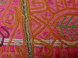 A beautiful silk embroidered Katawaz Hanging from Ghazni region of Afghanistan. It has fine chain-stitched silk embroidery, metal work and tiny mirrors. A lovely example with nice colours and design. Lined with  ...