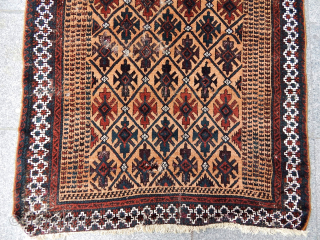 Antique Baluch Rug                              