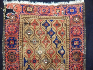 Antique Baluch Rug                              