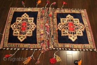Unqiue piled Persian Afshari Hand-knotted saddlebag 
CATEGORY: Persian
ORIGIN/TYPE: Afshari/Medalion Design 
AGE CLASSIFICATION: 1950+
SIZE:57" (145cm) x 29" (74cm)
CONDITION: Excellent
ID(APRC): No. 249-6034 
https://www.facebook.com/photo.php?fbid=143419032472149&set=a.143419022472150.32467.100634546750598&type=1&theater            