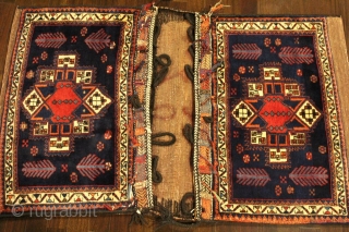 Spectacular Persian Afshari hand-knotted complete saddlebag in very rare design.
CATEGORY: Persian
ORIGIN/TYPE: Afshari/Medalion Design 
AGE CLASSIFICATION: 1950+
SIZE:56" (142cm) x 34" (88cm)
CONDITION: Excellent
ID(APRC): No. 249-3379 
https://www.facebook.com/media/set/?set=a.143417279138991.32464.100634546750598&type=1         