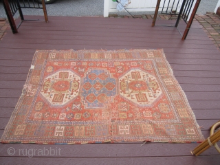 antique worn caucasian kazak rug measure 5' 2" x 6' condition is worn as shown solid rug not dry beautiful colors 675.00 or best offer        