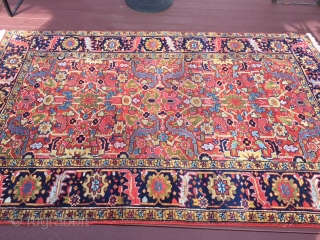 authentic signed persian heriz rug measures 5' 7" x 8' 9" great rare size beautiful colors great condition minor surface wear in the middle and few minor moth bite on the side  ...