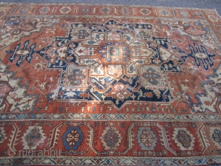 antique persian heriz serapi measuring 8' 3" x 11' 6" no pets no smoke no dry rot in very poor condition with lots of old repair cuts tear  as found being  ...