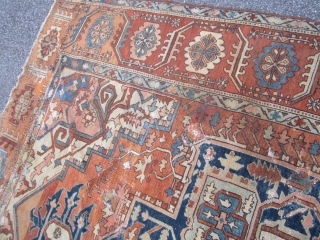 antique persian heriz serapi measuring 8' 3" x 11' 6" no pets no smoke no dry rot in very poor condition with lots of old repair cuts tear  as found being  ...