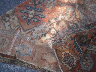 antique persian heriz serapi measuring 8' 3" x 11' 6" no pets no smoke no dry rot in very poor condition with lots of old repair cuts tear  as found being  ...