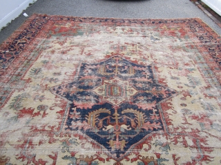 antique oversize serapi heriz rug worn condition beautiful colors has been cleaned no dry rot 2 big holes and 3 tear in one side easy restoration for huge profit measures 11' 7"  ...