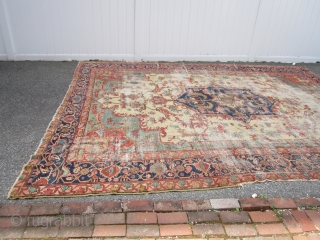 antique oversize serapi heriz rug worn condition beautiful colors has been cleaned no dry rot 2 big holes and 3 tear in one side easy restoration for huge profit measures 11' 7"  ...