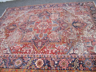 nicely worn persian heriz serapi rug measuring 8' 10" x 11' 4" great colors wear as shown one end needs work very supple no dry rot no animal well made very reasonable.  ...