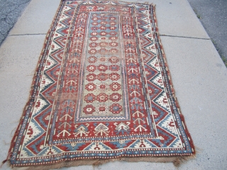 solid antique caucasian rug in worn condition great design and colors clean rug no dry rot. 4' 2"  x 7' 4" SOLD THANKS         