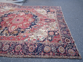 antique heriz serapi rug measuring 9' 5" x 11' 3" great design and colors has wear but solid rug very floppy  both ends and sides are good no holes clean rug  ...