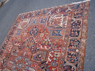 heriz rug measuring 8' 8" x 11'7" good colors good pile some wear and old moth damage as shown no holes has been cleaned 1050.00 usd plus shipping SOLD THANKS   